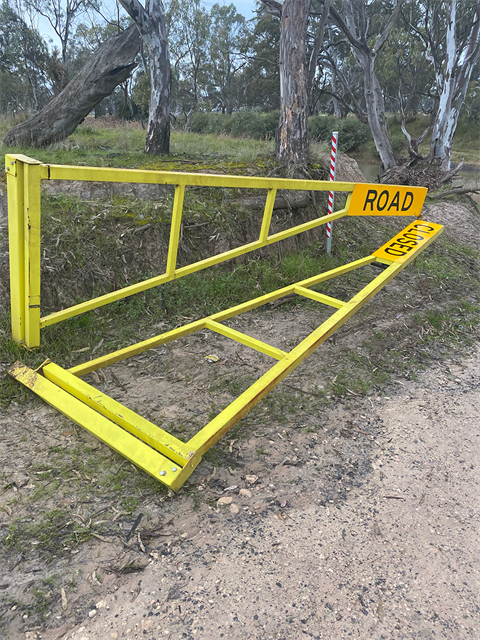 Damaged gates at O'Bree's Crossing.png