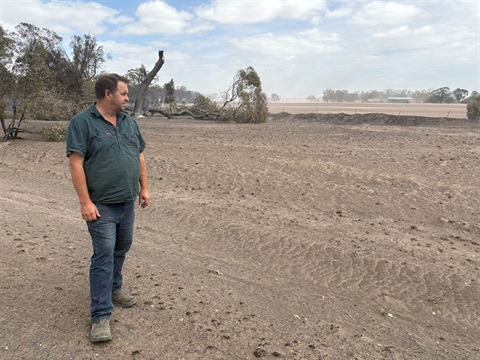 farmer-in-burned-field.jpg