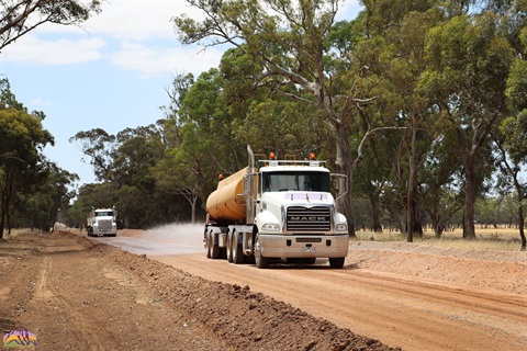 Trucks doing Roadworks at Brimpaen on unsealed road