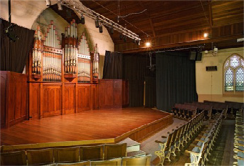 The Wesley stage with the pipe organ visible at the back