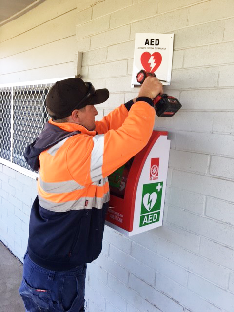 Marc Smith installing defibrillator at Dudley Cornell.png