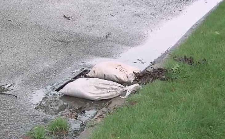 Sandbags block drain.png